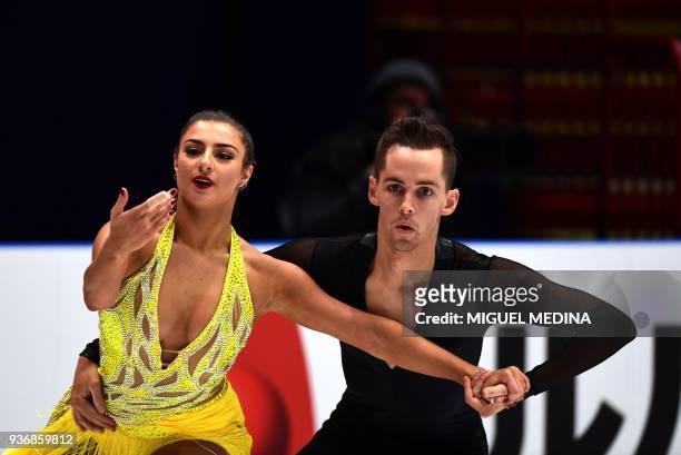 Chantelle Kerry and Andrew Dodds from Australia perform on March 23, 2018 during the Ice Dance-Short Dance program at the Milano World Figure Skating...