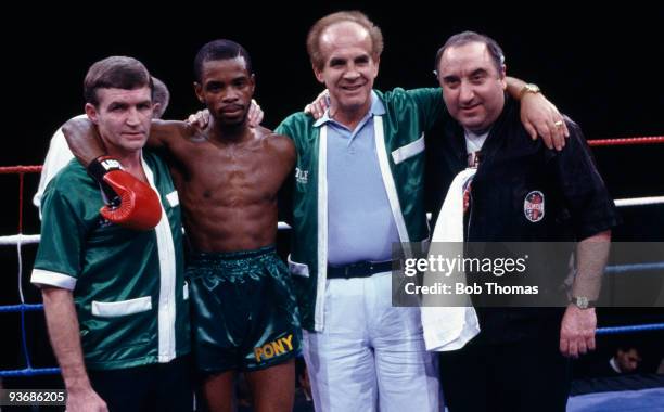 Great Britain's new European Flyweight Champion Duke McKenzie pictured with his management team after knocking out Agapito Gomez at the Wembley Arena...