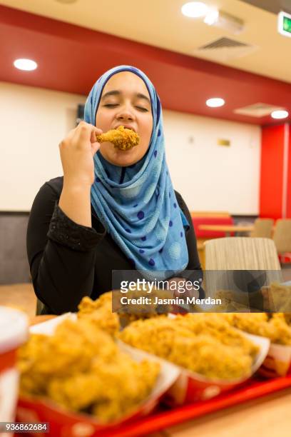 Muslim female in restaurant