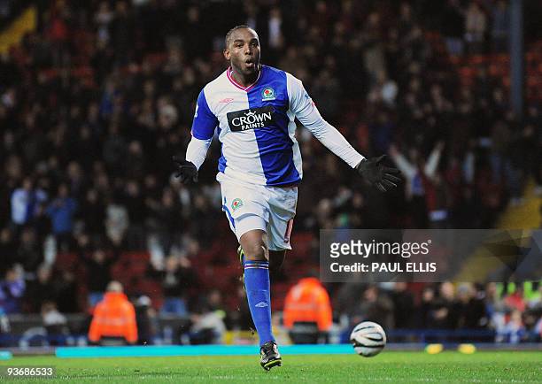 Blackburn Rovers' South African forward Benni McCarthy scores a penalty kick in extra time against Chelsea during their English League Cup football...