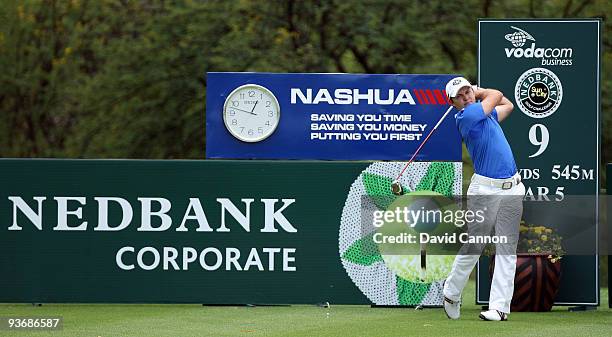 Richard Sterne of South Africa plays his tee shot at the 9th hole during the first round of the Nedbank Golf Challenge at the Gary Player Country...