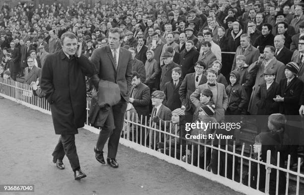 British former soccer player Tommy Docherty, new manager of Aston Villa FC, arrives at Villa Park for his first match against Norwich FC, Birmingham,...