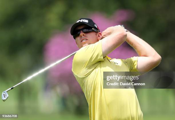 Hunter Mahan of the USA plays his second shot at the 9th hole during the first round of the Nedbank Golf Challenge at the Gary Player Country Club at...