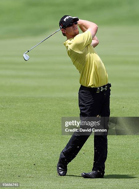 Hunter Mahan of the USA plays his third shot at the 9th hole during the first round of the Nedbank Golf Challenge at the Gary Player Country Club at...