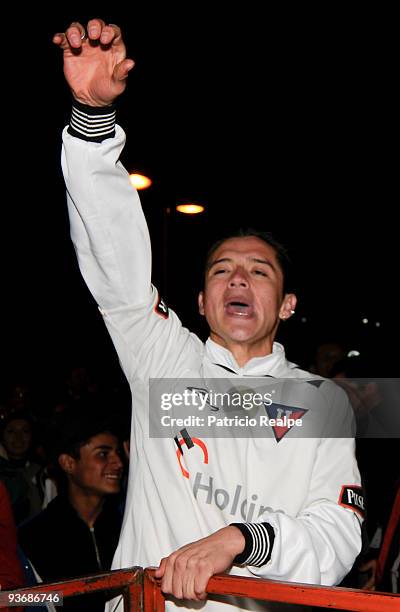 Ecuador's Liga Deportiva Universitaria's fans celebrate after winning a Copa Nissan Sudamericana against Brazil's Fluminense on December 02, 2009 in...