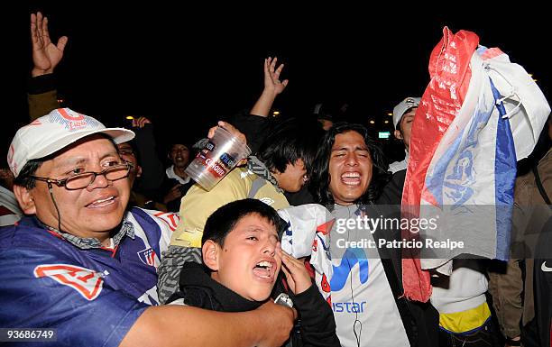 Ecuador's Liga Deportiva Universitaria's fans celebrate after winning a Copa Nissan Sudamericana against Brazil's Fluminense on December 02, 2009 in...