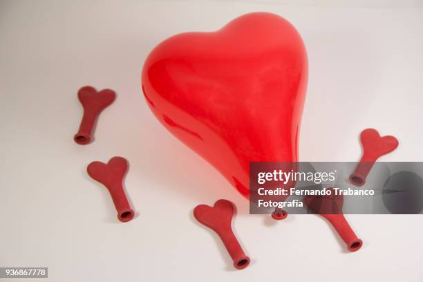 balloon with heart shape - surgical glove balloon stock pictures, royalty-free photos & images