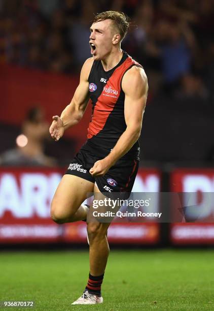 Joshua Begley of the Bombers celebrates kicking a goal during the round one AFL match between the Essendon Bombers and the Adelaide Crows at Etihad...