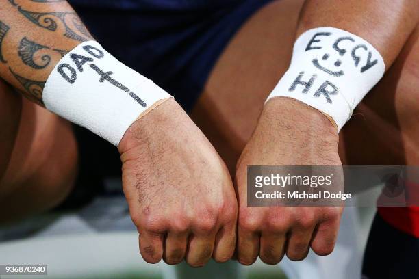 Michael Ruru of the Rebels shows off motivational messages during the round six Super Rugby match between the Melbourne Rebels and the Sharks at AAMI...