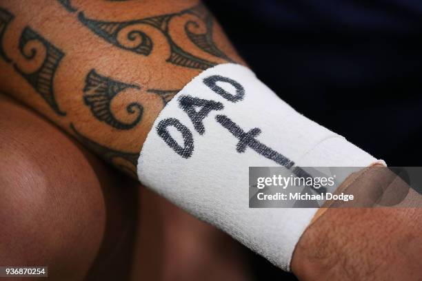 Michael Ruru of the Rebels shows off motivational messages during the round six Super Rugby match between the Melbourne Rebels and the Sharks at AAMI...