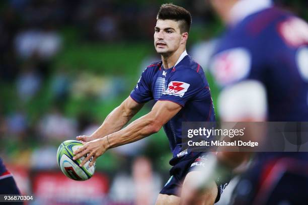 Jack Debreczeni of the Rebels runs with the ball during the round six Super Rugby match between the Melbourne Rebels and the Sharks at AAMI Park on...