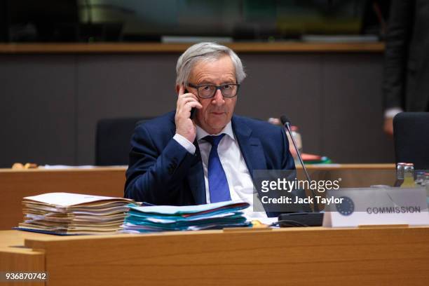 President of the European Commission Jean-Claude Juncker sits at his desk ahead of roundtable discussions in the Europa Building on the final day of...