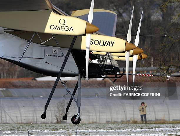 Aircraft dubbed 'Solar Impulse', HB-SIA prototype flies for the first time with test pilot Markus Scherdel on bord on December 3, 2009 in Duebendorf...