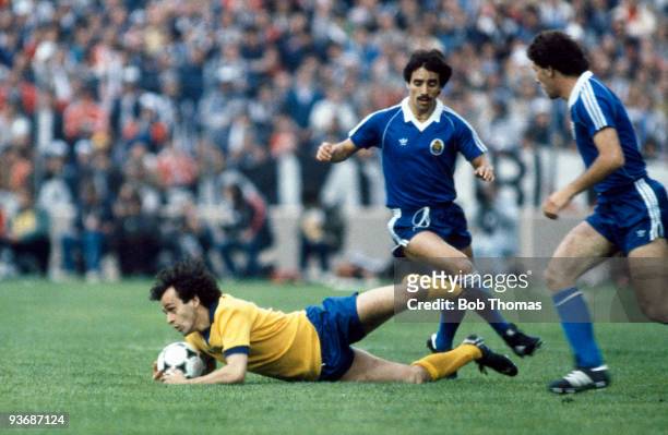 Michel Platini of Juventus is tackled by Antonio Viera of Porto during the Juventus v Porto European Cup Winners Cup Final played at the St Jakob...