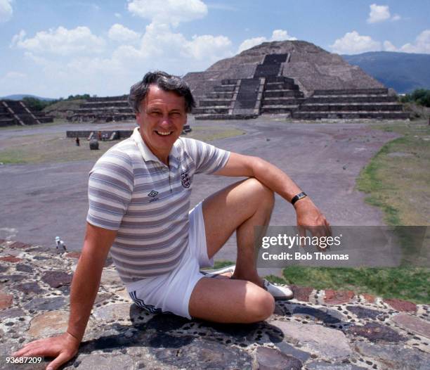 England manager Bobby Robson relaxes in front of the Pyramid of the Moon in Teotihuacan during the team's summer tour to Mexico on the 10th June 1985.