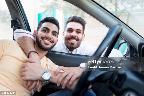 arabic guy in car - arabien stock-fotos und bilder