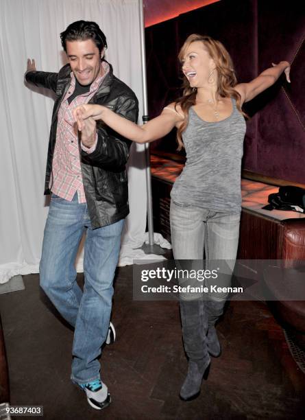 Actor Gilles Marini and dancer Karina Smirnoff attend the Ubisoft and Oxygen YOUR SHAPE fitness game launch party at Hyde Lounge on December 2, 2009...