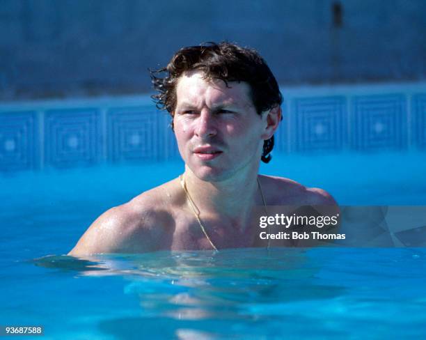 England footballer Clive Allen relaxes in the swimming pool in Rio de Janeiro during the team's summer tour to South America on the 9th June 1984.