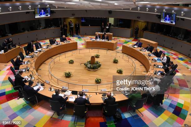 Heads of state and government attend a meeting on the second day of a summit of European Union leaders at the European Council headquarter in...