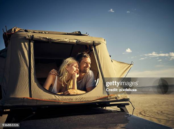 it feels like home out here - camping couple stock pictures, royalty-free photos & images