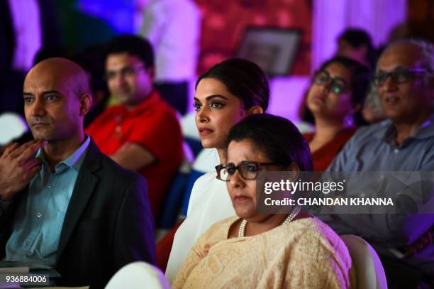 Indian Bollywood actress Deepika Padukone, founder of the Live Love Laugh Foundation, looks on during the unveiling event for a report on the public...