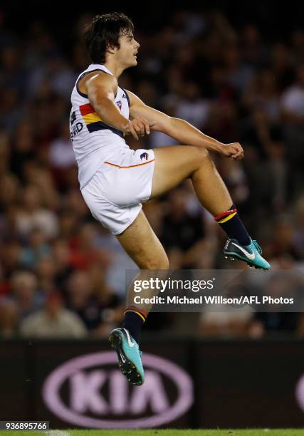 Darcy Fogarty of the Crows kicks his first league goal during the 2018 AFL round 01 match between the Essendon Bombers and the Adelaide Crows at...