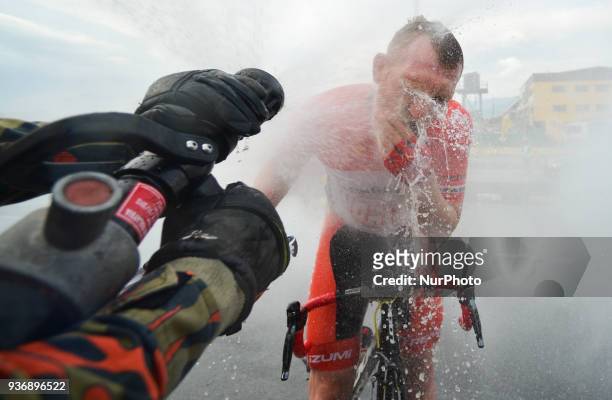 Andris Vosekalns enjoys the water curtain at the finish line of the sixth stage, the 108.5km from Tapah to Tanjung Malim, of the 2018 Le Tour de...