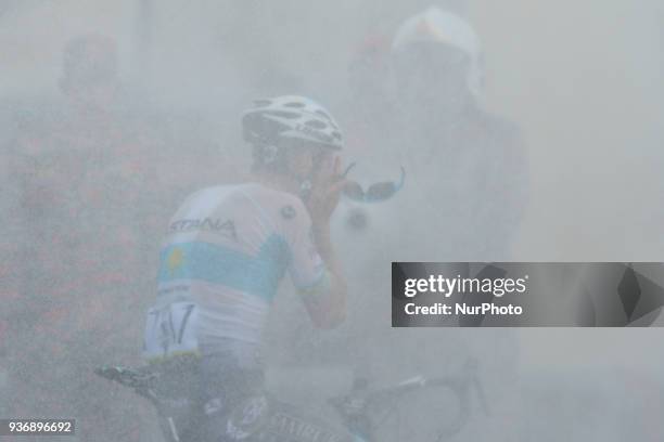 Bakhtiyar Kozhatayev from Astana Pro Team enjoys the water curtain at the finish line of the sixth stage, the 108.5km from Tapah to Tanjung Malim, of...