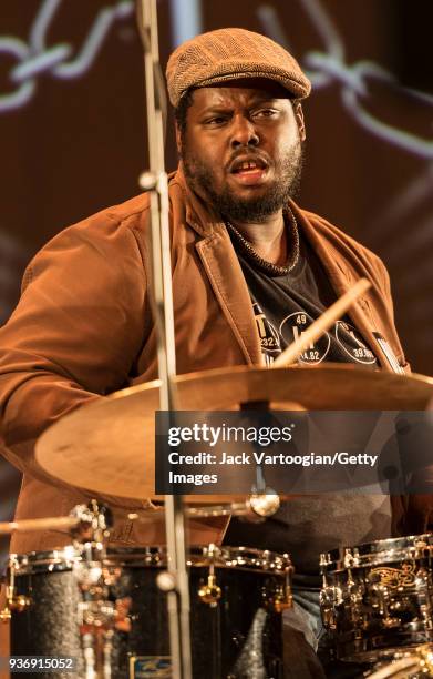 American Jazz musician Johnathan Blake plays drums as he performs with the Arturo O'Farrill Band during a 'Musicians Against Fascism' benefit concert...