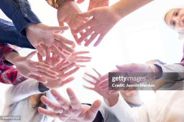 family with hands together - ramadan greeting stock pictures, royalty-free photos & images