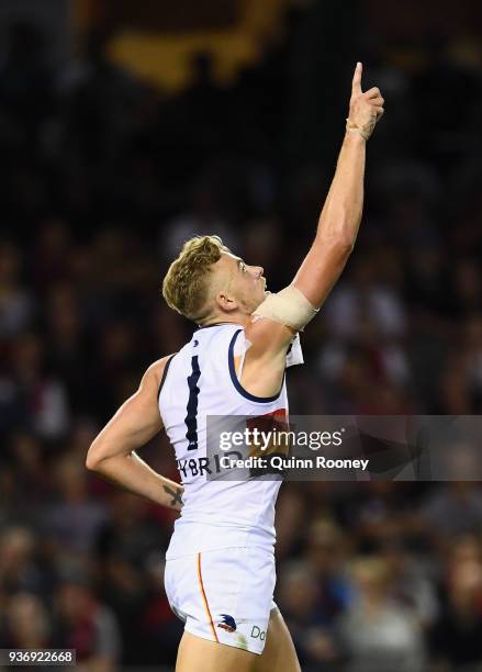 Hugh Greenwood of the Crows celebrates kicking a goal during the round one AFL match between the Essendon Bombers and the Adelaide Crows at Etihad...