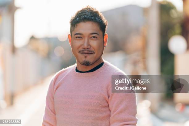 portrait of a mid adult male - asian men stock pictures, royalty-free photos & images