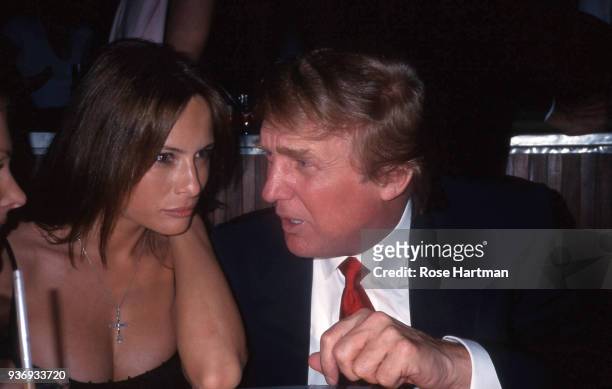 Close-up of Yugoslavian model Melania Knauss and American real estate developer Donald Trump as they talk together at Nello's restaurant , New York,...
