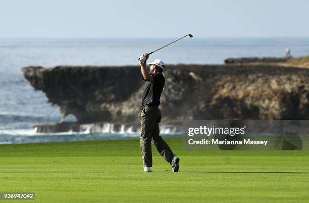 George McNeill plays his second shot on the 18th hole during round two of the Corales Puntacana Resort & Club Championship on March 23, 2018 in Punta...