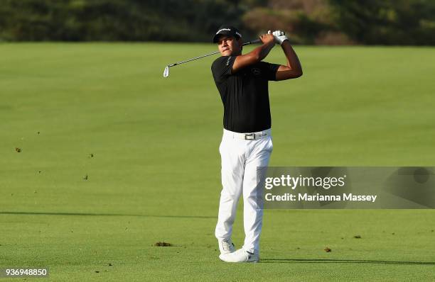 Fabian Gomez of Argentina plays his second shot on the first hole during round two of the Corales Puntacana Resort & Club Championship on March 23,...