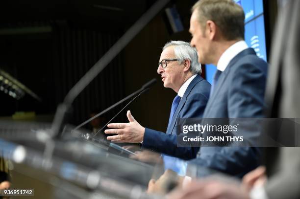 European Commission President Jean-Claude Juncker and European council President Donald Tusk deliver a speech during a joint press conference on the...