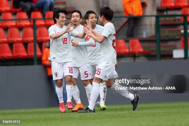Shoya Nakajima of Japan celebrates after scoring a goal to make it 1-1 during the International friendly match between Japan and Mali at the Stade de...
