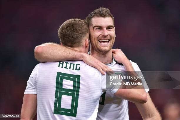 Sam Vokes, right, of Wales national football team celebrates with his teammate Andy King after scoring against Chinese national men's football team...