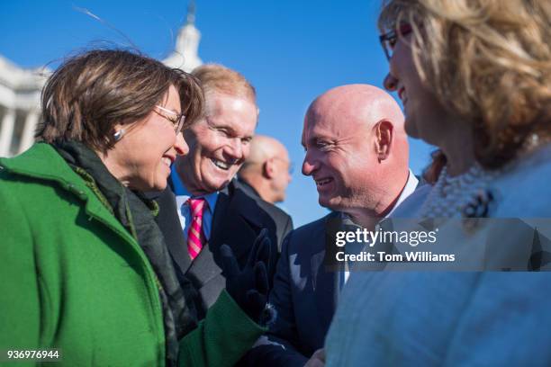 From left, Sens. Amy Klobuchar, D-Minn., Bill Nelson, D-Fla., Mark Kelly, and his wife former Rep. Gabrielle Giffords, D-Ariz., are seen after a news...