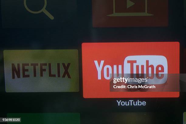 The YouTube and Netflix app logos are seen on a television screen on March 23, 2018 in Istanbul, Turkey. The Government of Turkish President Recep...