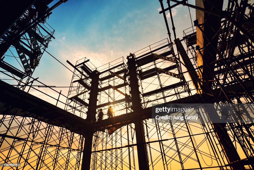 Construction site on sunset background