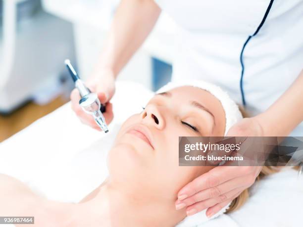face treatment - laser face stock pictures, royalty-free photos & images