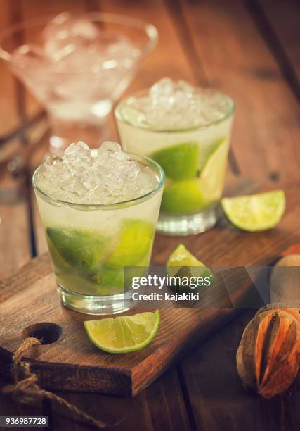 sweet and refreshing drink caipirinha cocktail - cachaça stock pictures, royalty-free photos & images