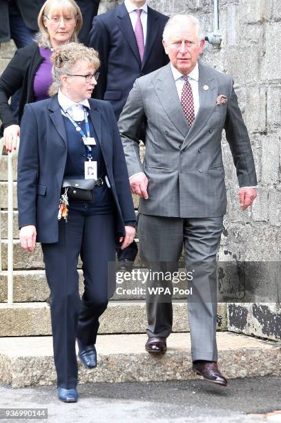 Prince Charles, Prince of Wales is accompanied by Governer Bridie Oakes-Richard as he visits HM Prison Dartmoor on March 23, 2017 in London, United...