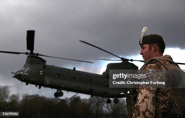 Soldier of 1st Battalion The Royal Welsh waits for a Chinook to land during an exercise before deployment to Afghanistan on December 3, 2009 in...