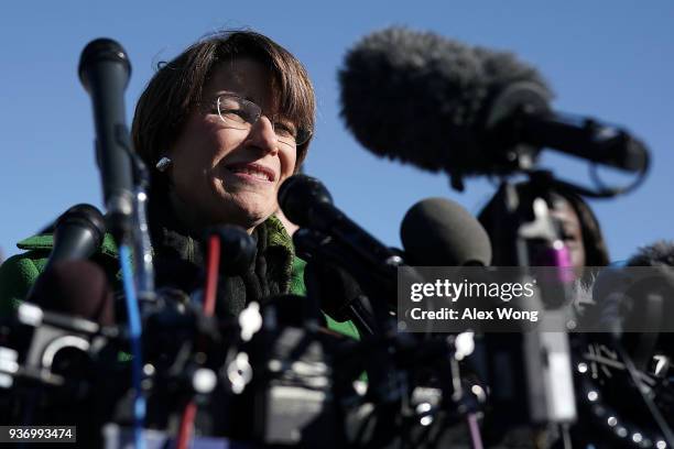 Sen. Amy Klobuchar participates in a news conference on gun control March 23, 2018 on Capitol Hill in Washington, DC. The lawmaker, joined by...