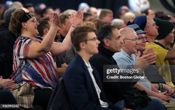 Audience members applaud during a panel discussing the Tax Cuts and Jobs Act of 2017 which included former U.S Senator Kelly Ayotte, Candice Benson,...