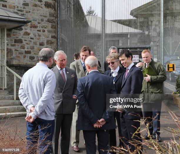 Prince Charles, Prince of Wales speaks to a prisoner who works as a Gardener, Horticultural Instructor James Gearing, Governer Bridie Oakes-Richard...