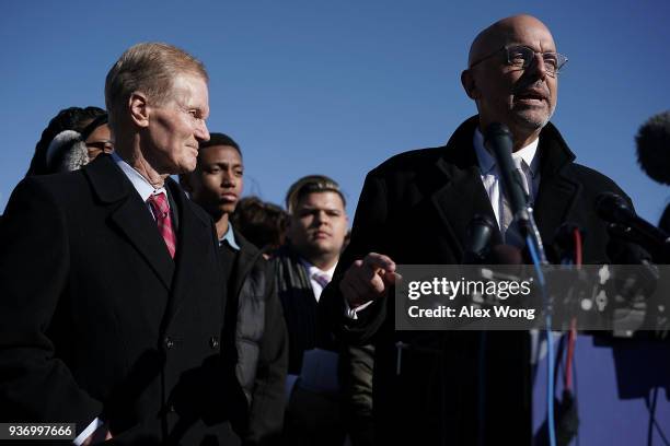 Rep. Ted Deutch speaks as Sen. Bill Nelson listens during a news conference on gun control March 23, 2018 on Capitol Hill in Washington, DC. The...