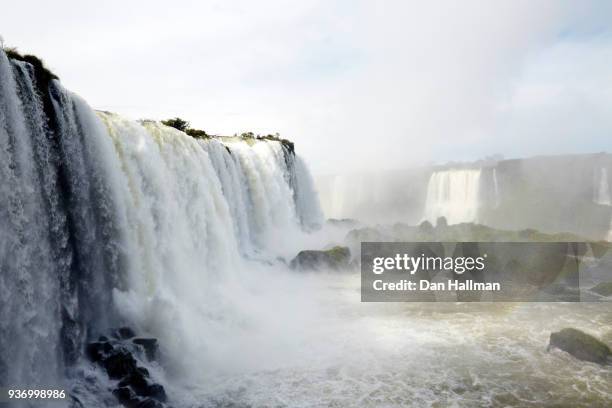 iguazu falls, cataratas del iguazú, cataratas do iguaçu - iguazú stock pictures, royalty-free photos & images